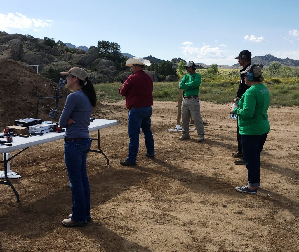 Spur Outfitters takes firearms training seriously. So much so that even the bosses come out and take classes! Here, Instructor Bubba works with Thad and Kristen York on their handgun skills.